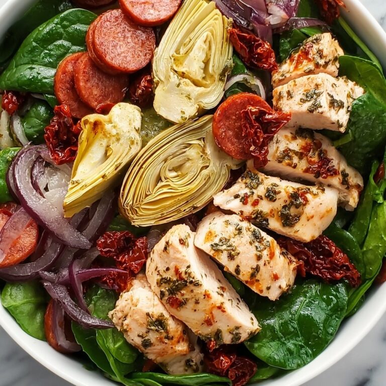 Italian Salad with Chicken, Spinach, Artichokes, Salami, Sun-Dried Tomatoes, and Red Onions Recipe